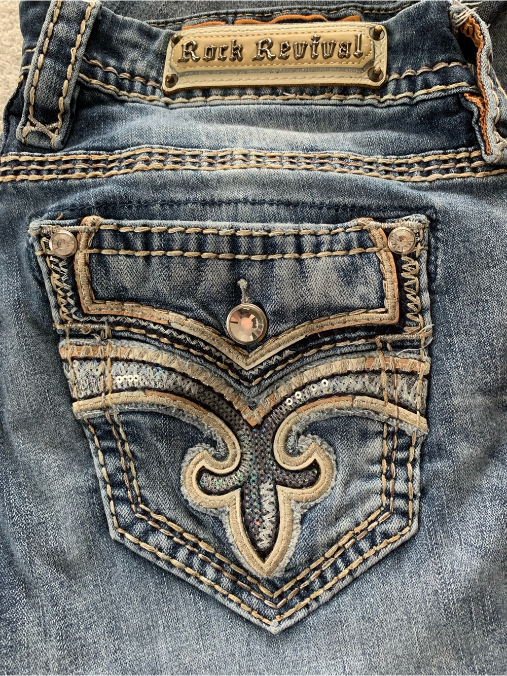 Rock Revival faded blue denim jeans with contrast stitching
